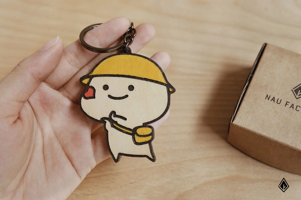 Móc khóa cắt shape bắn tim cute, tạo điểm nhấn phong cách cho người dùng. Ảnh: Nau Factory